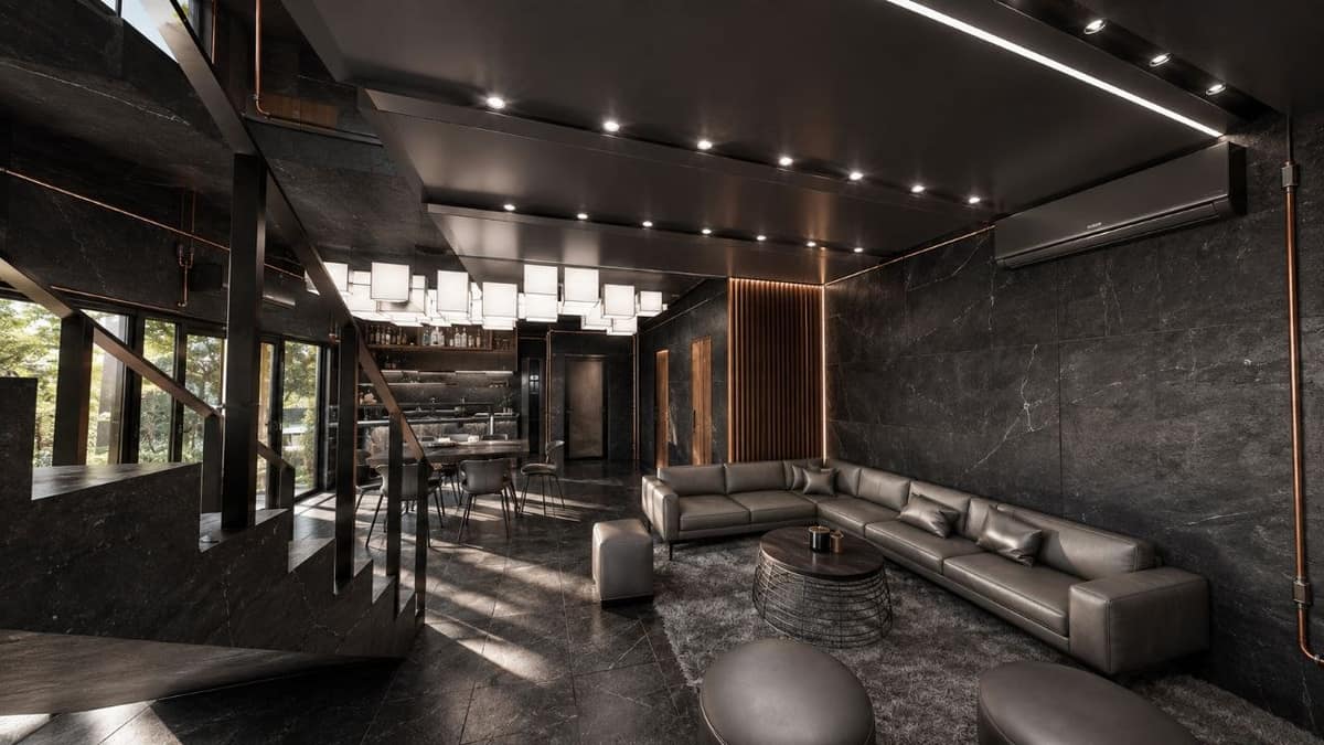 Calma.Basic black-skin living and dining — dark stone stair, copper conduits, cube lantern bar